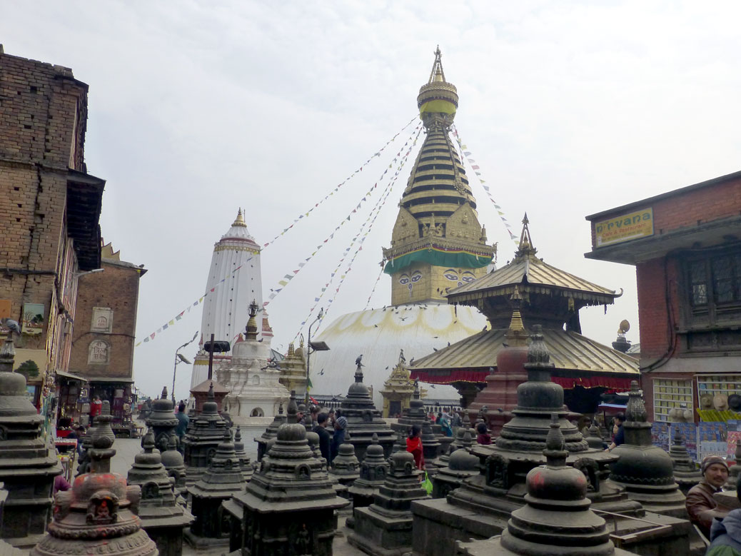 The stupa at Swayambhunath in February. The old shops and monastery residence building is still standing.