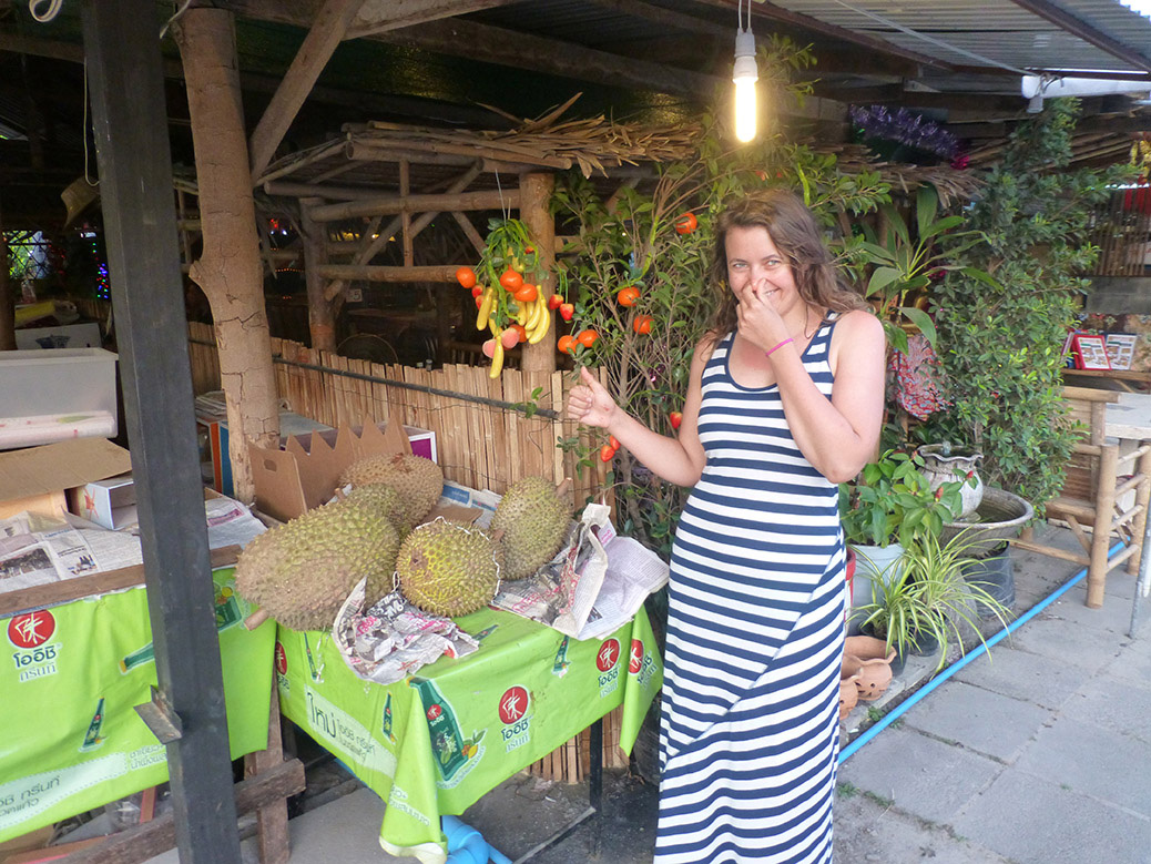 A produce stand selling durian. Durian is a popular fruit in Thailand. It smells and tastes like trash. Literally, like garbage.