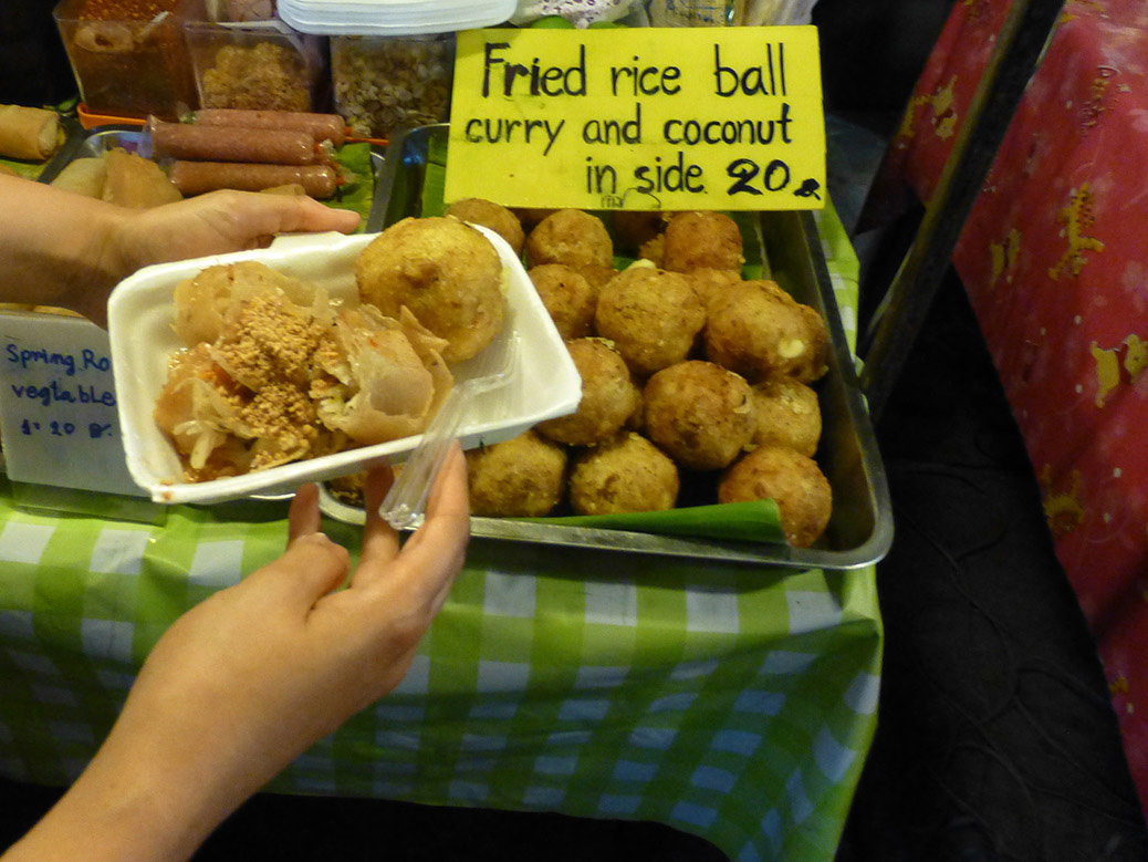 Finally some authentic street food! Egg roll and a fried rice ball in Fisherman's Village.