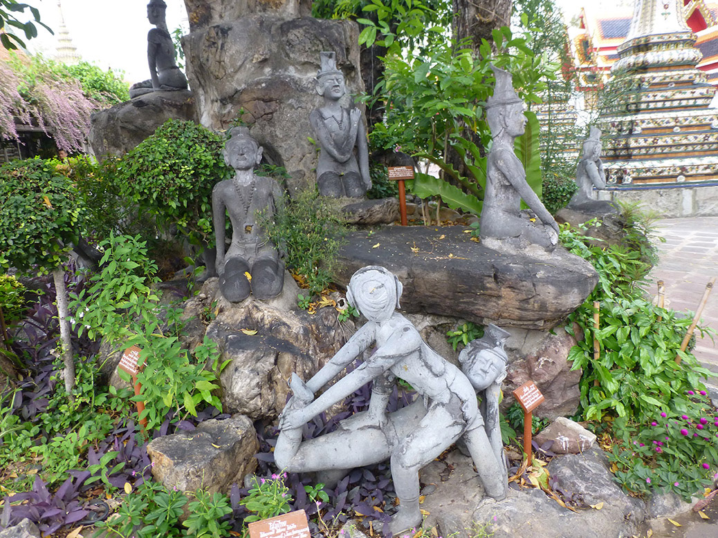 A statue garden in Wat Pho showed the various positions of Thai-style yoga. Each pose targets a specific ailment.