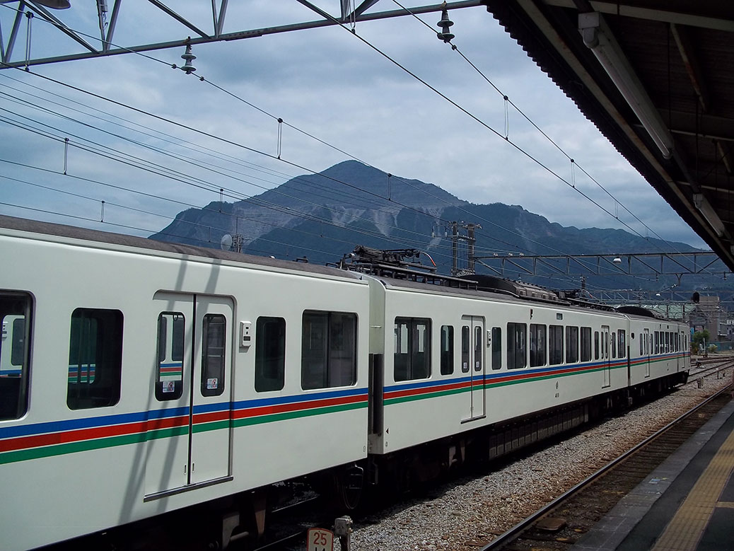 The train to the poppy fields with Mt. Buko in the background