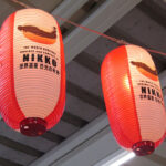 Lanterns hanging in Nikko Station advertise the local World Heritage Site