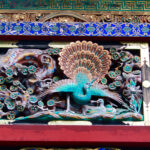 Close-up of some of the ornate decorations that cover the structures throughout Tōshō-gū Shrine. Each are being restored by hand, including paint and gold leafing.