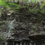 Stone Buddha statues, called Hotoke Iwa in Japanese, are located behind Kaizan-do under a cliff. It was said the image of Buddha was visible on the cliff, but after the cliff face collapsed in an earthquake, these statues were placed in the rubble.