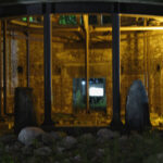 Inside the central dome structure. The fire-colored lighting cast an eerie glow inside the building.