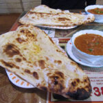 Lunch at Roopali included vegetable curry and infant-sized nan brushed with clarified butter.