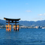 The Great Torii in the afternoon appears to float in Hiroshima Bay