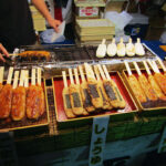 Grilled rice cakes (yaki onigiri) on a stick