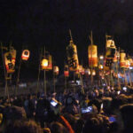 The opening procession features lanterns painted with the names of the Chichibu neighborhoods the carrier represents.