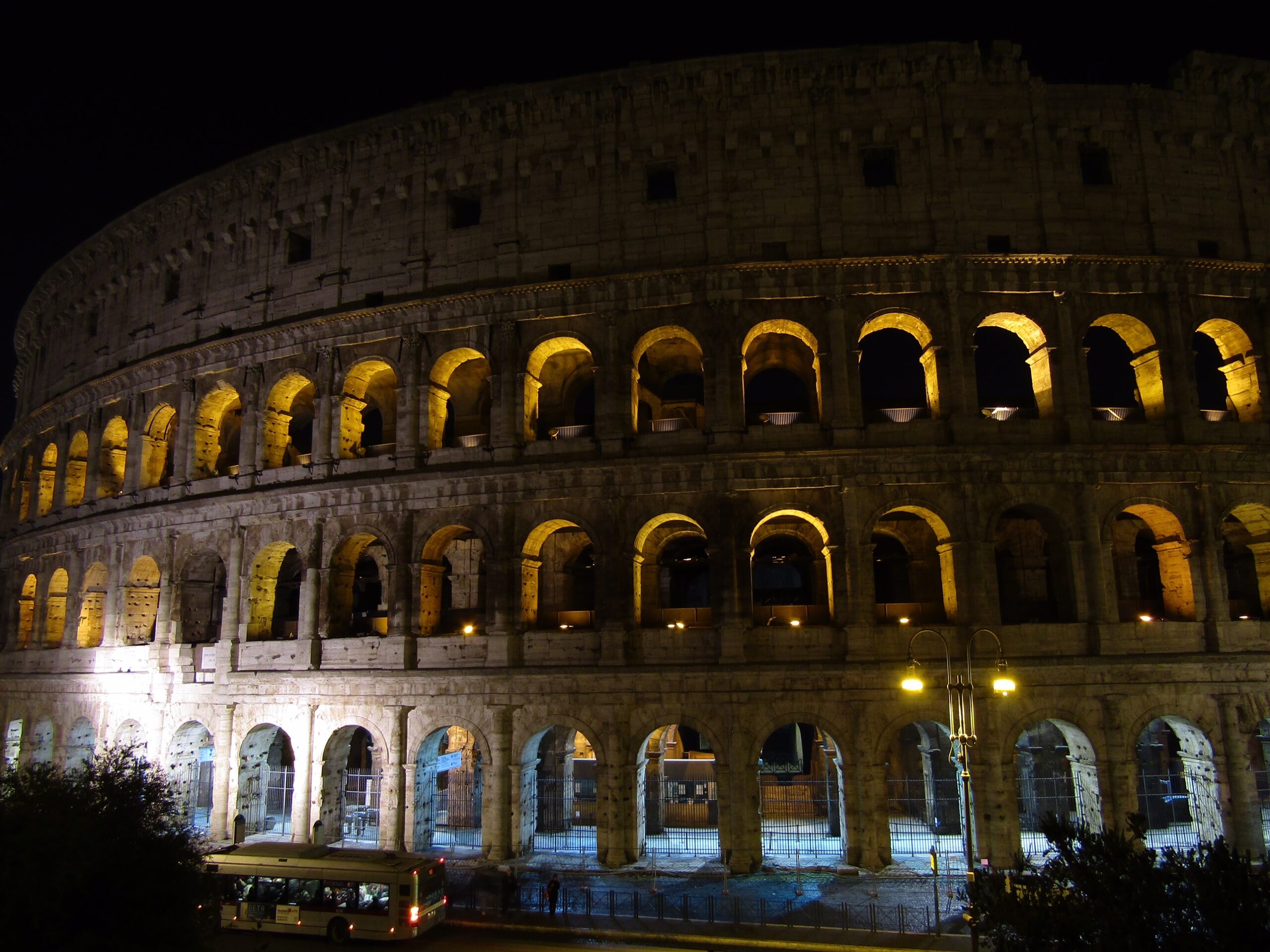 Rome's Colosseum was built in the first century A.D., holding an estimated 80,000 spectators for gladiator flights, war reenactment and other entertainment events. On a cold January night nearly 2,000 years later, just a few of us sat along the stone rail at the end of Via Del Serpenti to enjoy the architectural marvel in all its splendor.