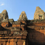 Climbing the steps of Pre Rup, one of Angkor's oldest temples.