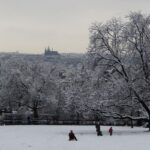 Kids sliding down the slopes of Riegrovy Sady.