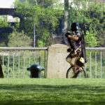 A Unipiper sighting! Unicyclist Brian Kidd is famous for rolling around town in a Darth Vader helmet playing occasionally-flaming bagpipes.