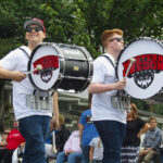 Members of the Western Oregon University drumline march in the 2016 Western Days Parade.