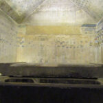 King Unas’s funerary chamber with black stone sarcophagus.