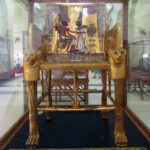 The wooden throne of Tutankhamun features an image of him under the sun (‘Aten’ for his birth name Tutankhaten) while his queen applies perfume on him.