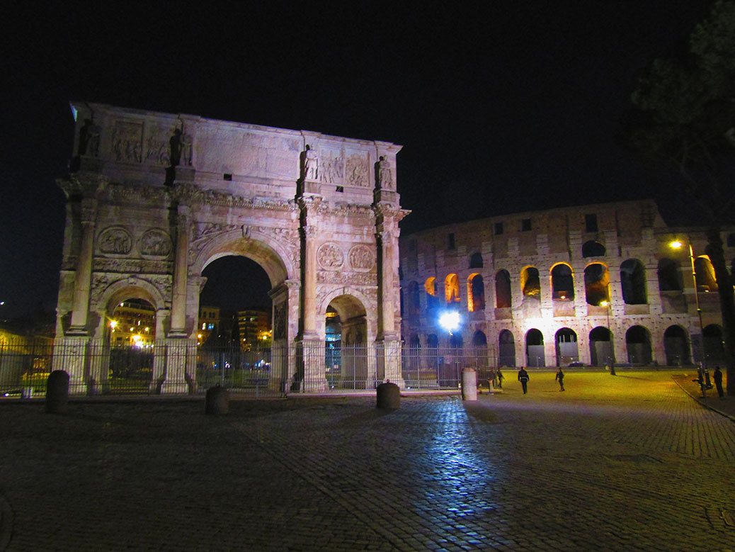 The Arch of Constantine and the Colosseum in Rome.