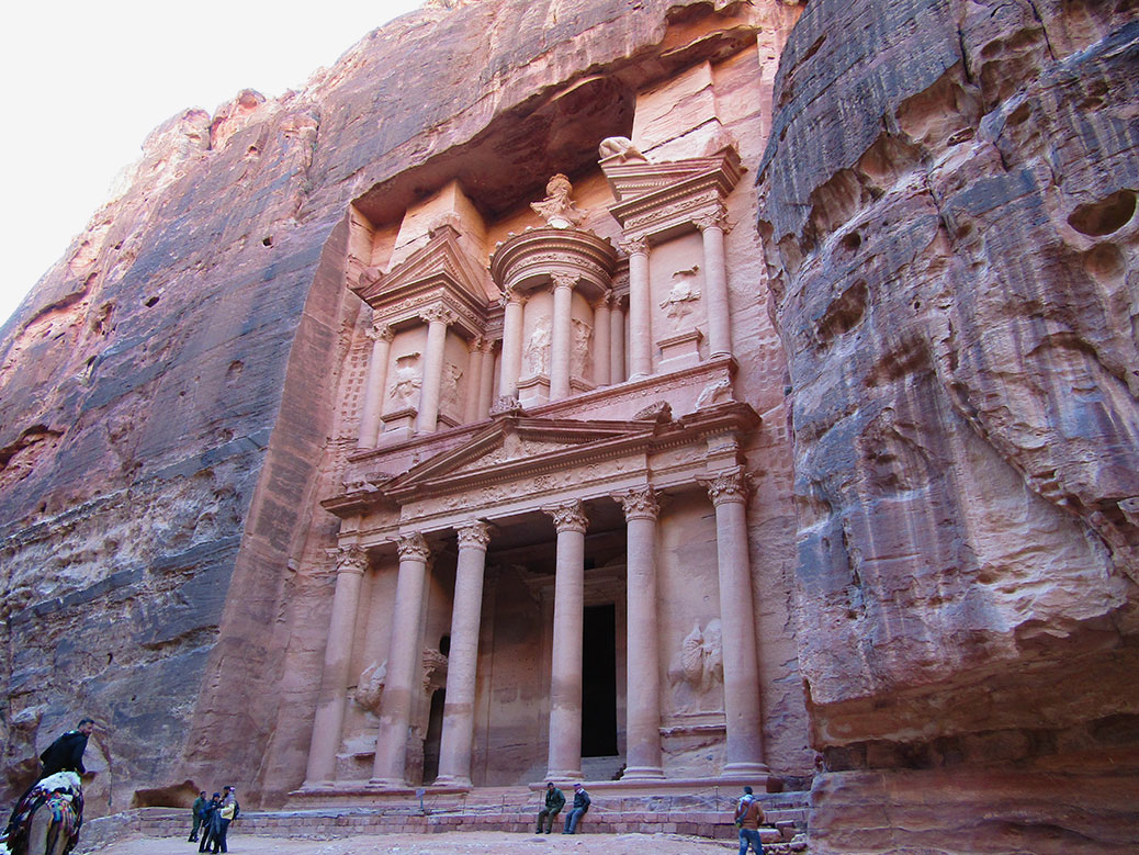 View of the beautiful sandstone Treasury carved into the canyon.